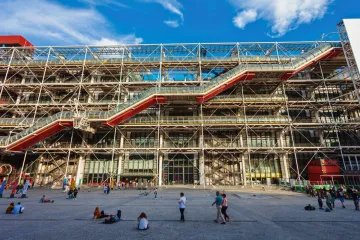 Exterior of the Pompidou Center in Paris, with its exposed industrial design and colorful external escalators.